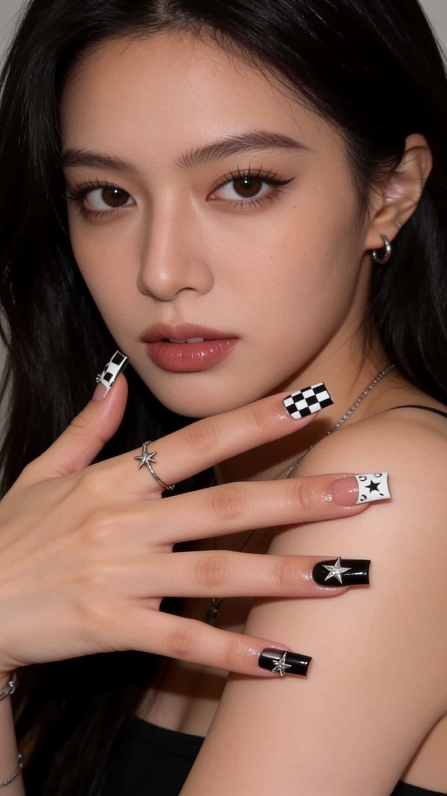 Square-coffin nails with monochrome glossy finish and French tip design.