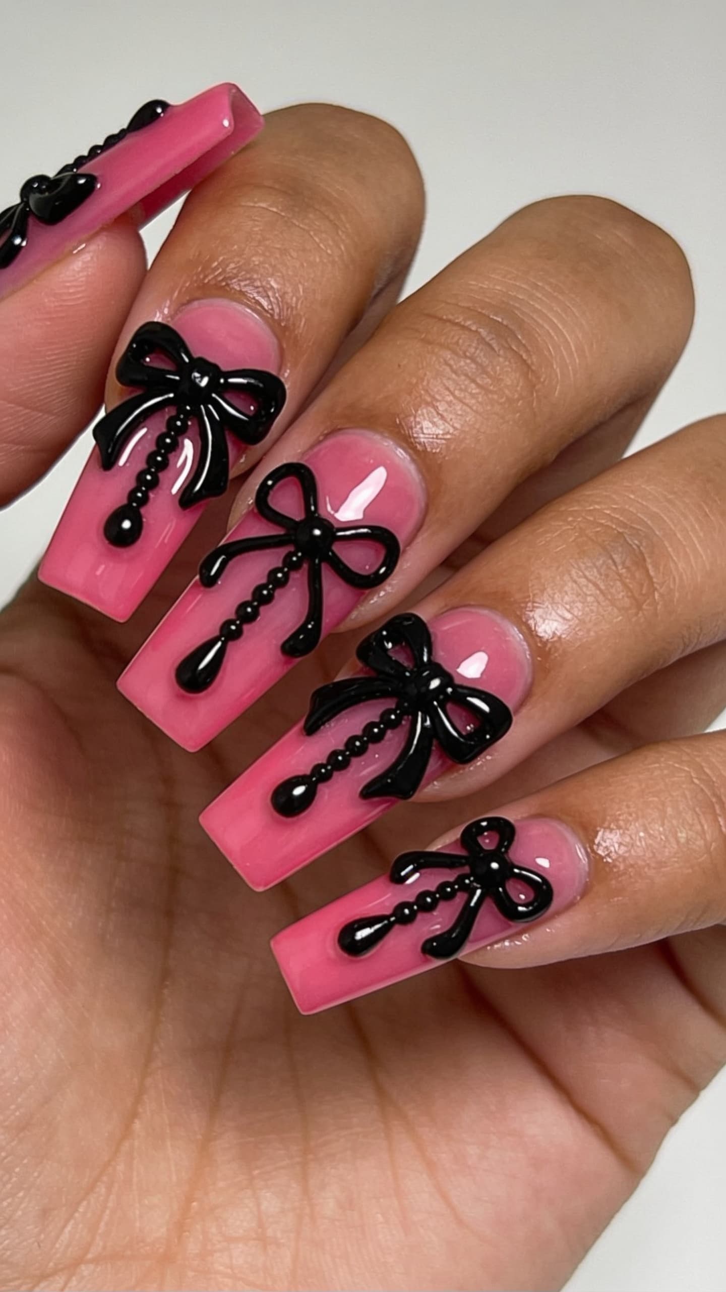 Pink 3D Bow Chains nail inspo: statement bows that work best as a single accent on short nails