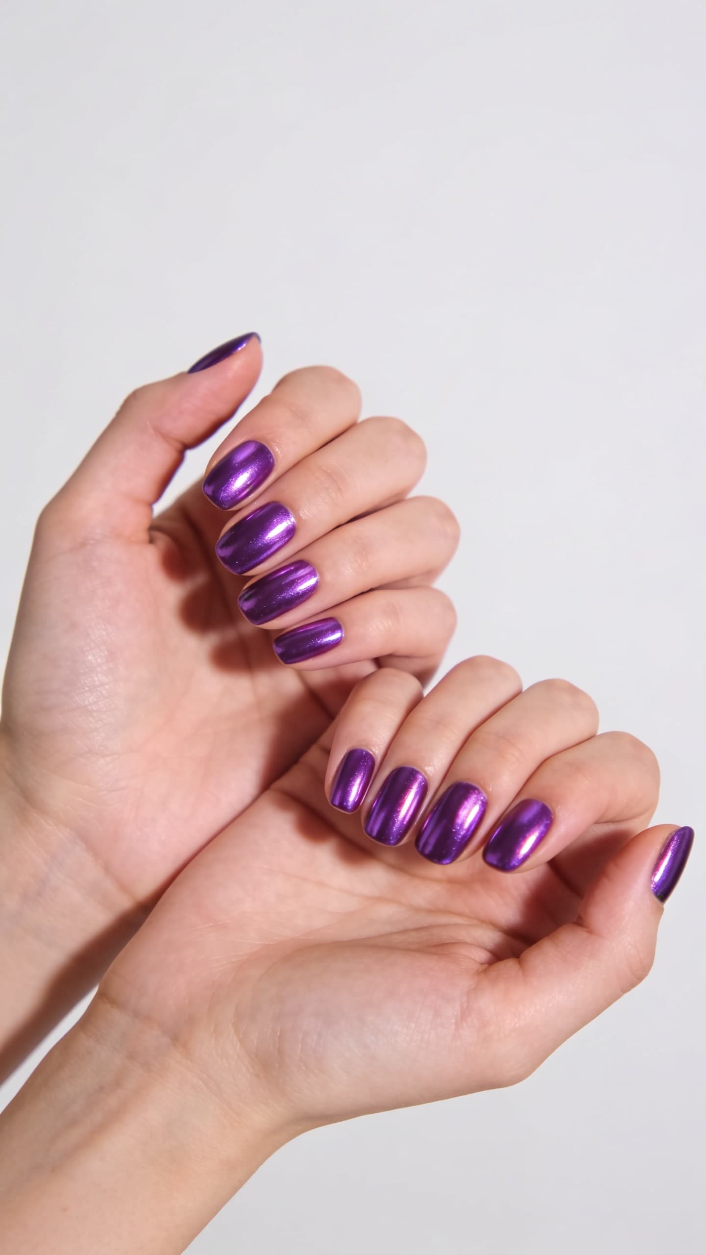 Purple chrome nails shown for comparison with magnetic cat eye finish