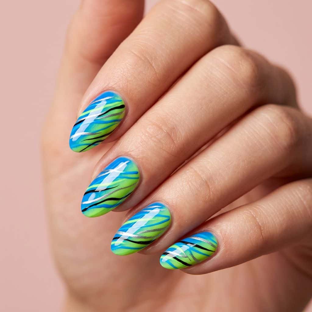 A sleek, modern nail art design featuring a gradient of electric blue to neon green hues, applied in a smooth, glossy finish.