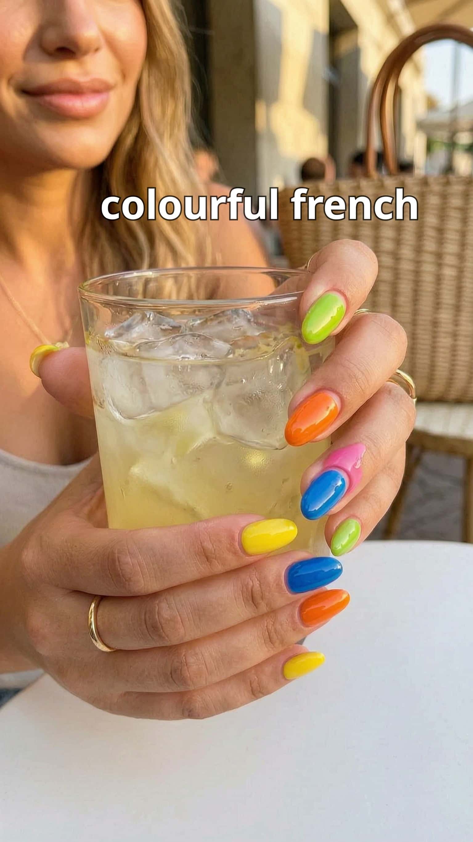 4 glazed nail ideas on manicured hands, including glazed pastel french, soft mismatched polka, colourful french.