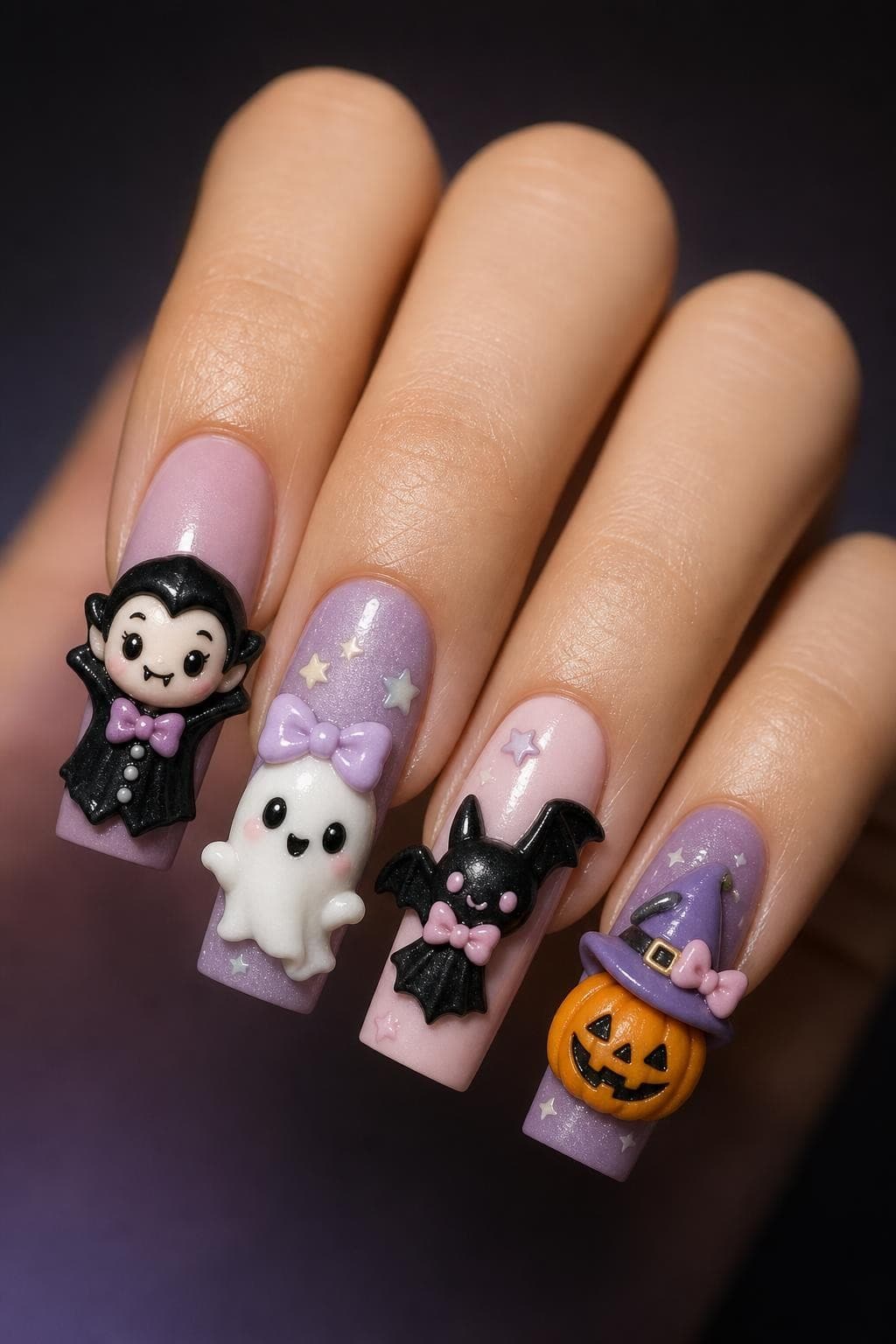 3D Halloween cartoon character nails that need a longer art appointment