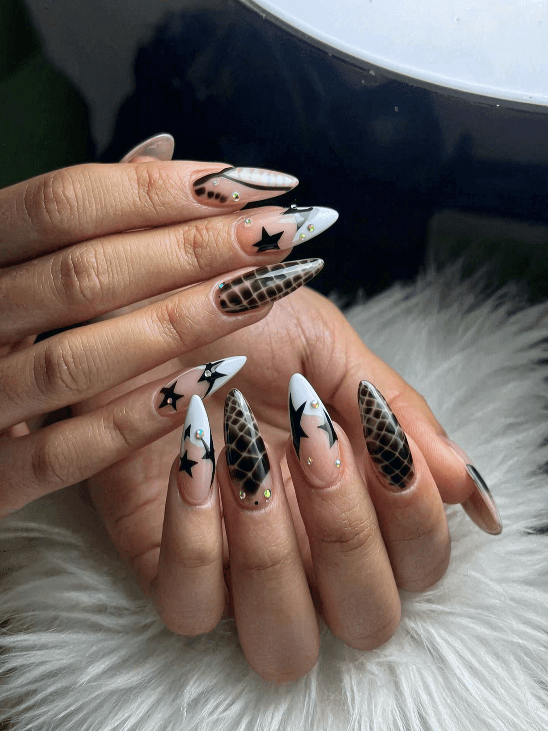 5 stiletto nail ideas on manicured hands, tagged nail art, nail inspo, stiletto nails.