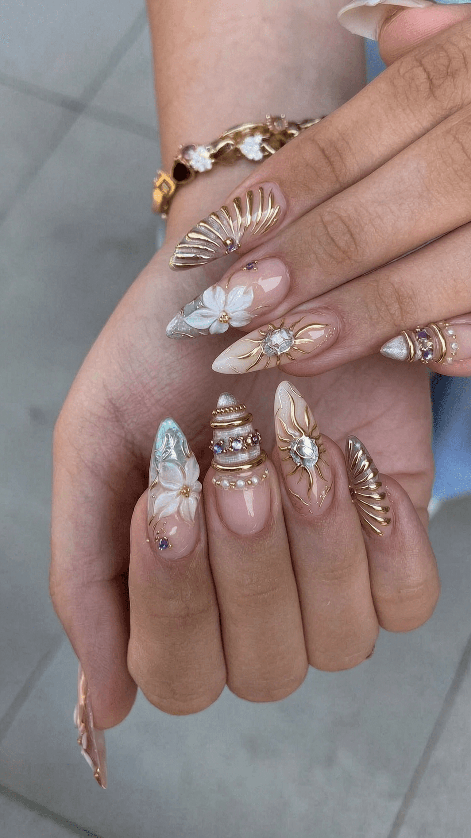 6 luxury nail ideas on manicured hands, tagged nail art, nail inspo, 3dnails.