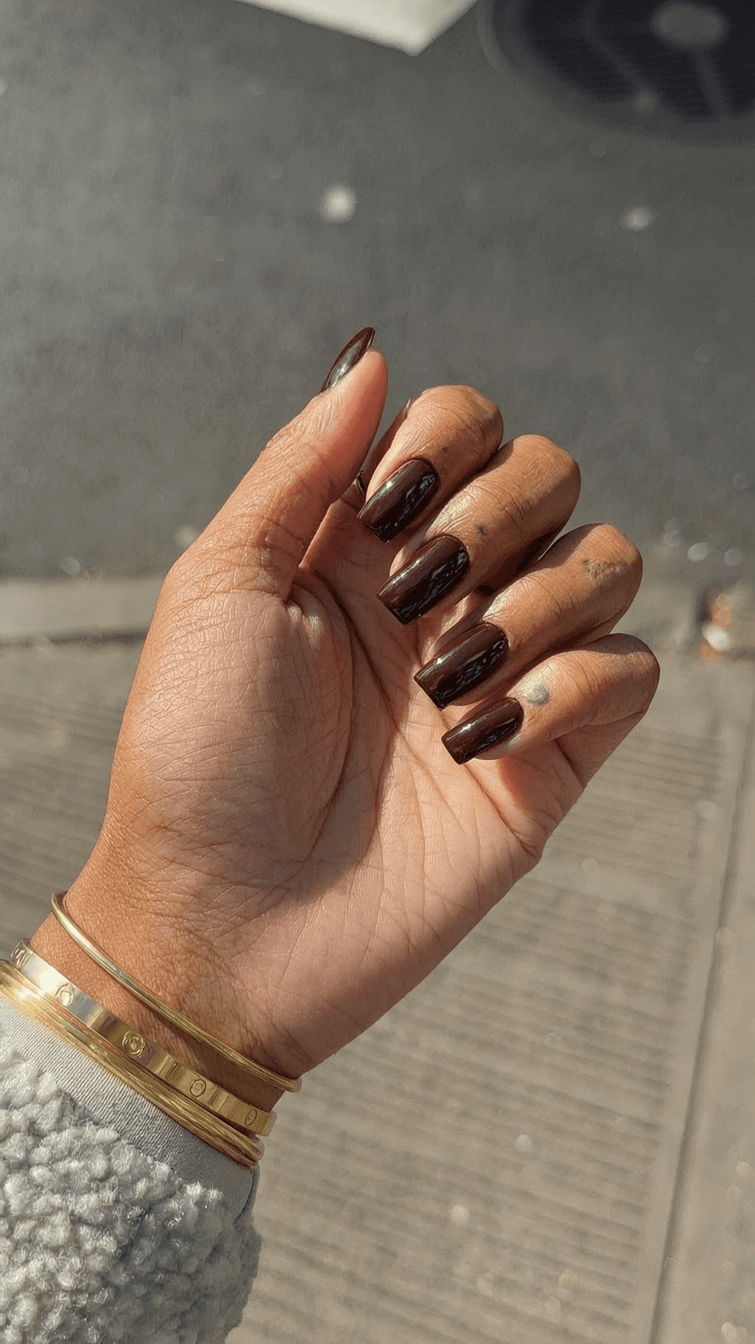 6 brown nail ideas on manicured hands, tagged chocolatenails, nail inspo, fall manicure.