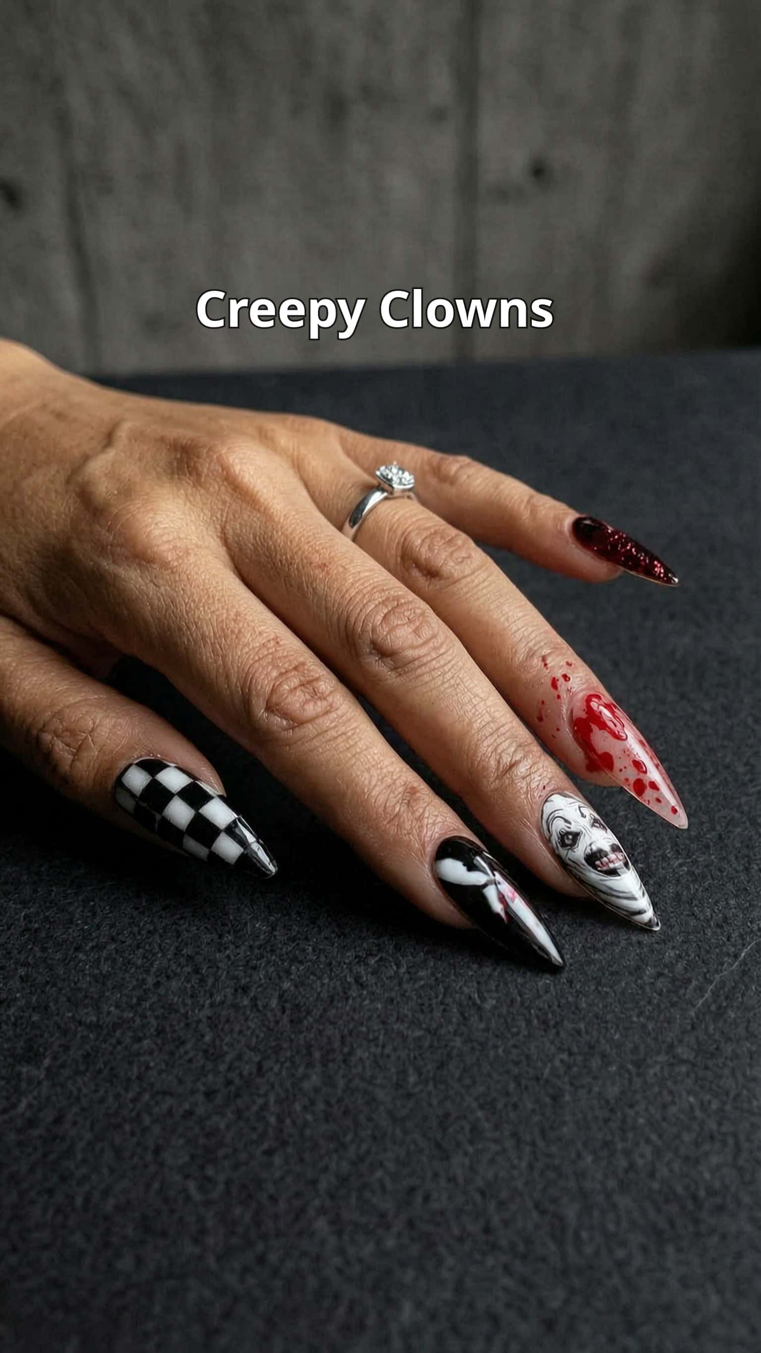 5 halloween nail ideas on manicured hands, including creepy clowns, haunted kitty, friendly ghosts, bats.