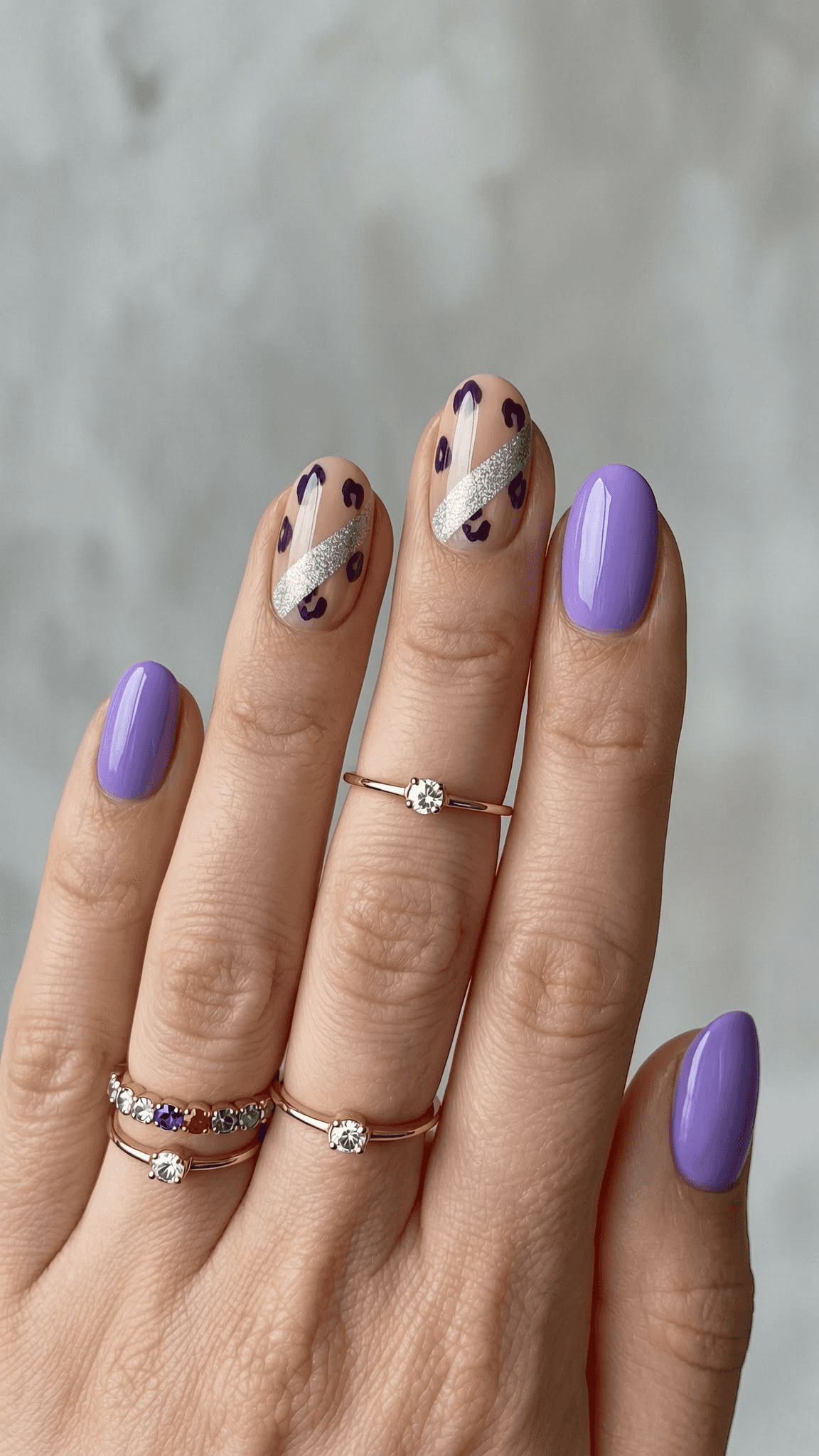 4 trendy nail ideas on manicured hands, tagged nail inspo, nail art, animalprintnails.