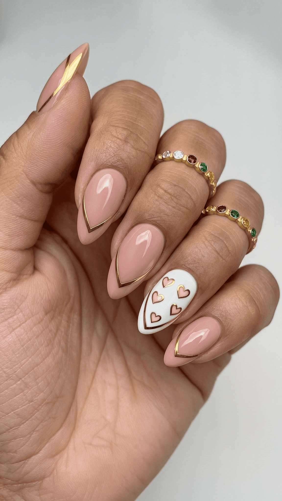 5 luxury nail ideas on manicured hands, tagged nail inspo, luxury nails, nail art.