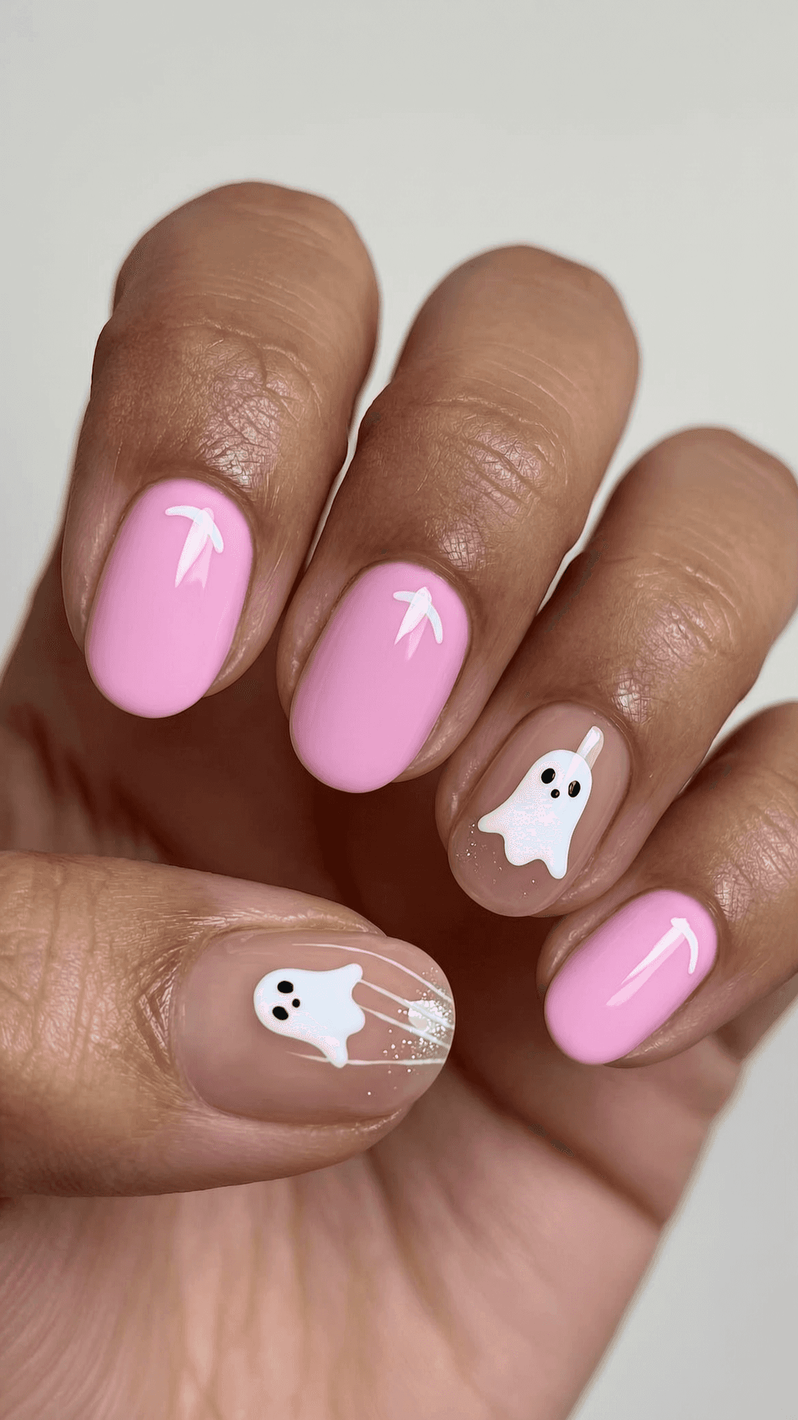 9 halloween nail ideas on manicured hands, tagged halloween nails, spooky nails, nail inspo.