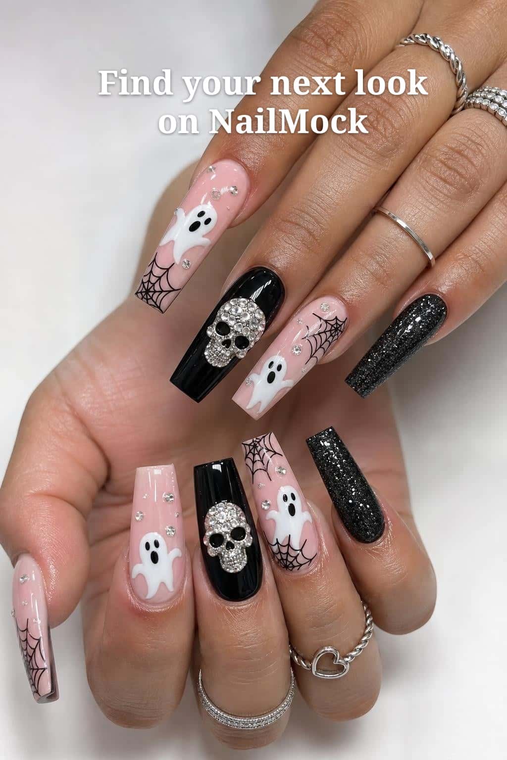 9 halloween nail ideas on manicured hands, tagged halloween nails, spookyseason, spooky nails.