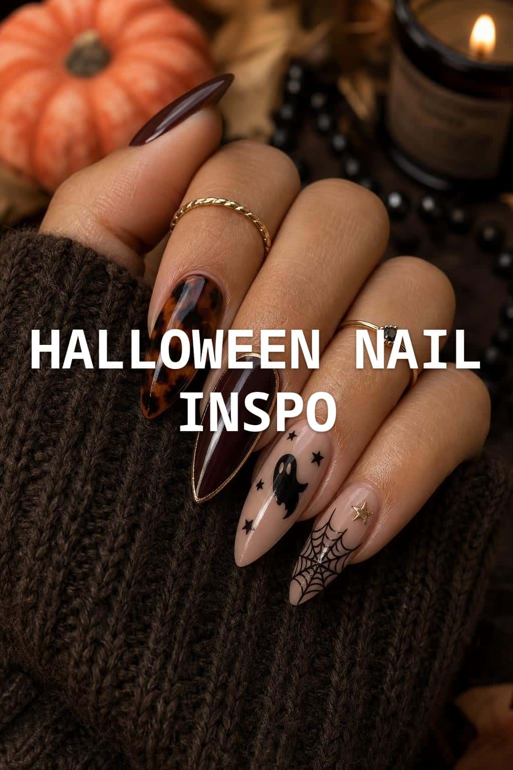 7 black nail ideas on manicured hands, including black cats, bloody drips, bats, snakes & mystical.