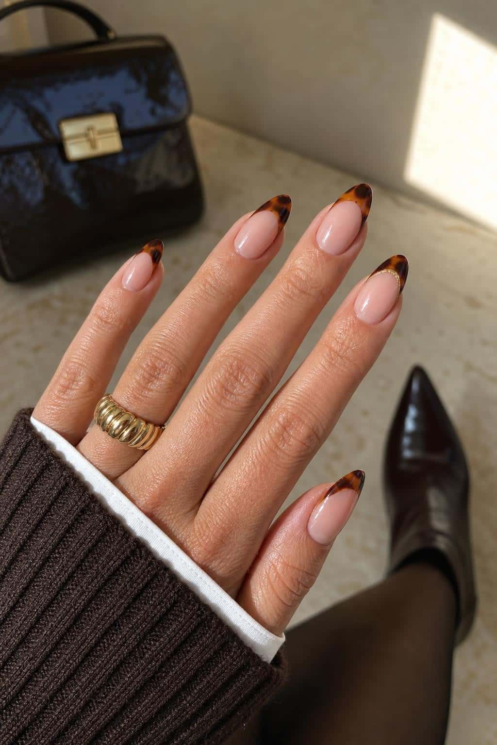 7 fall nail ideas on manicured hands, tagged fall nails, october nails, autumn trends.