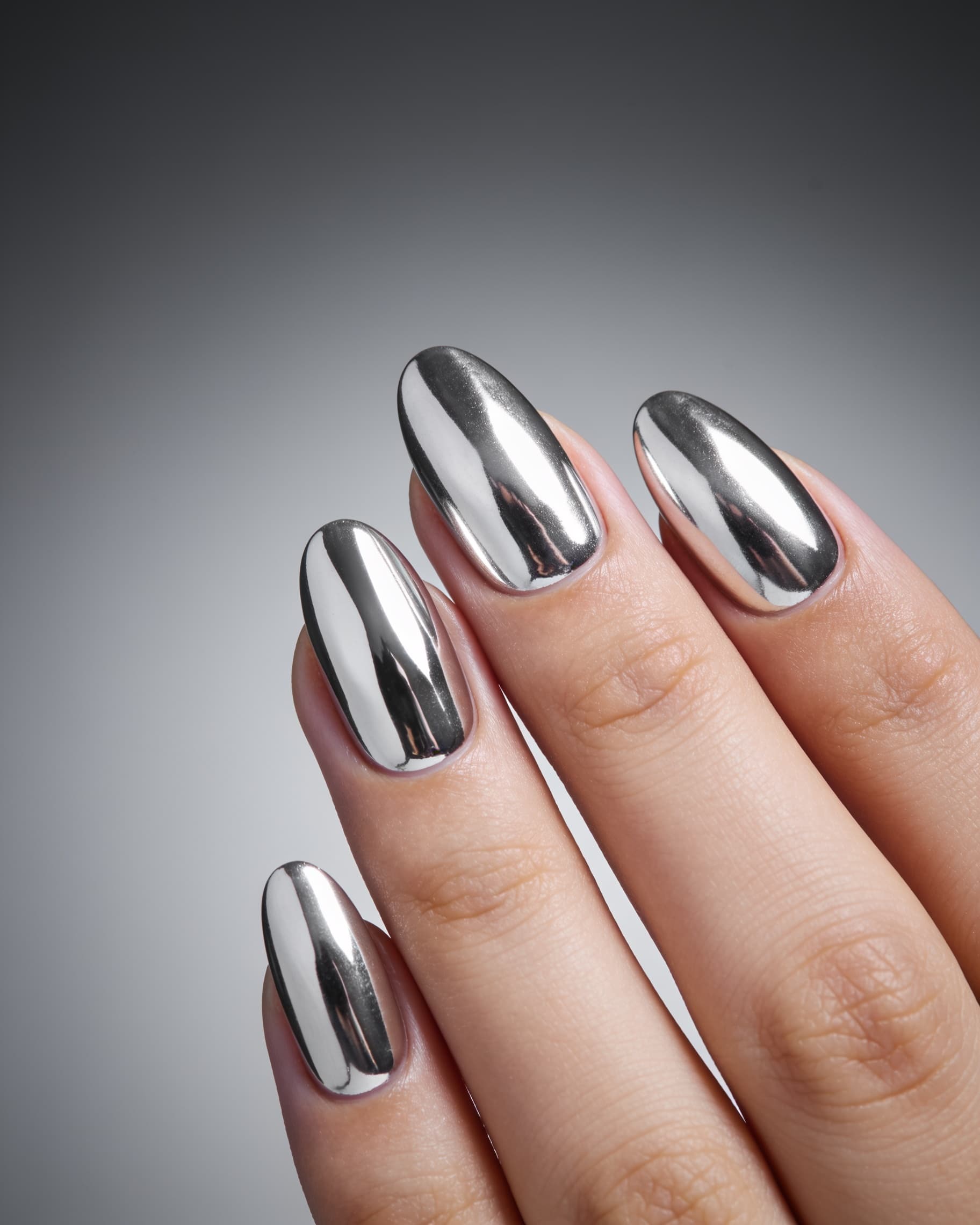 Chrome metallic nail design preview: mirror-finish silver gel nails from NailMock try-on