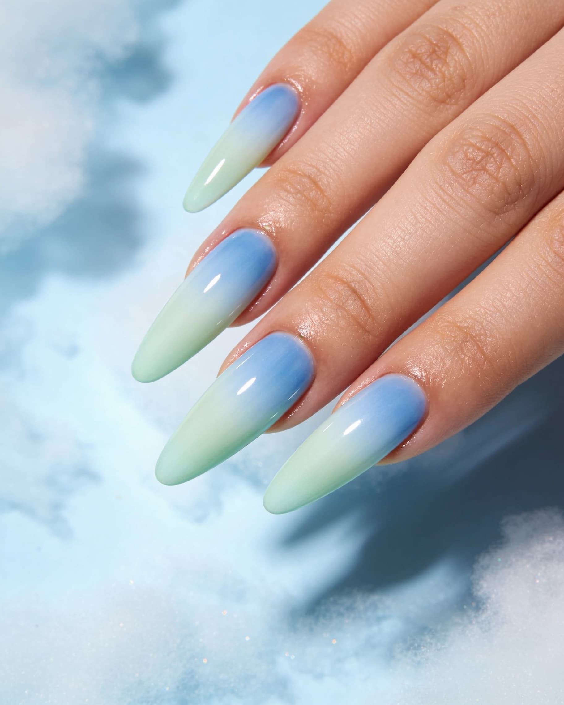 Pastel gradient nail art preview: blue to mint ombre on coffin nails via AI try-on
