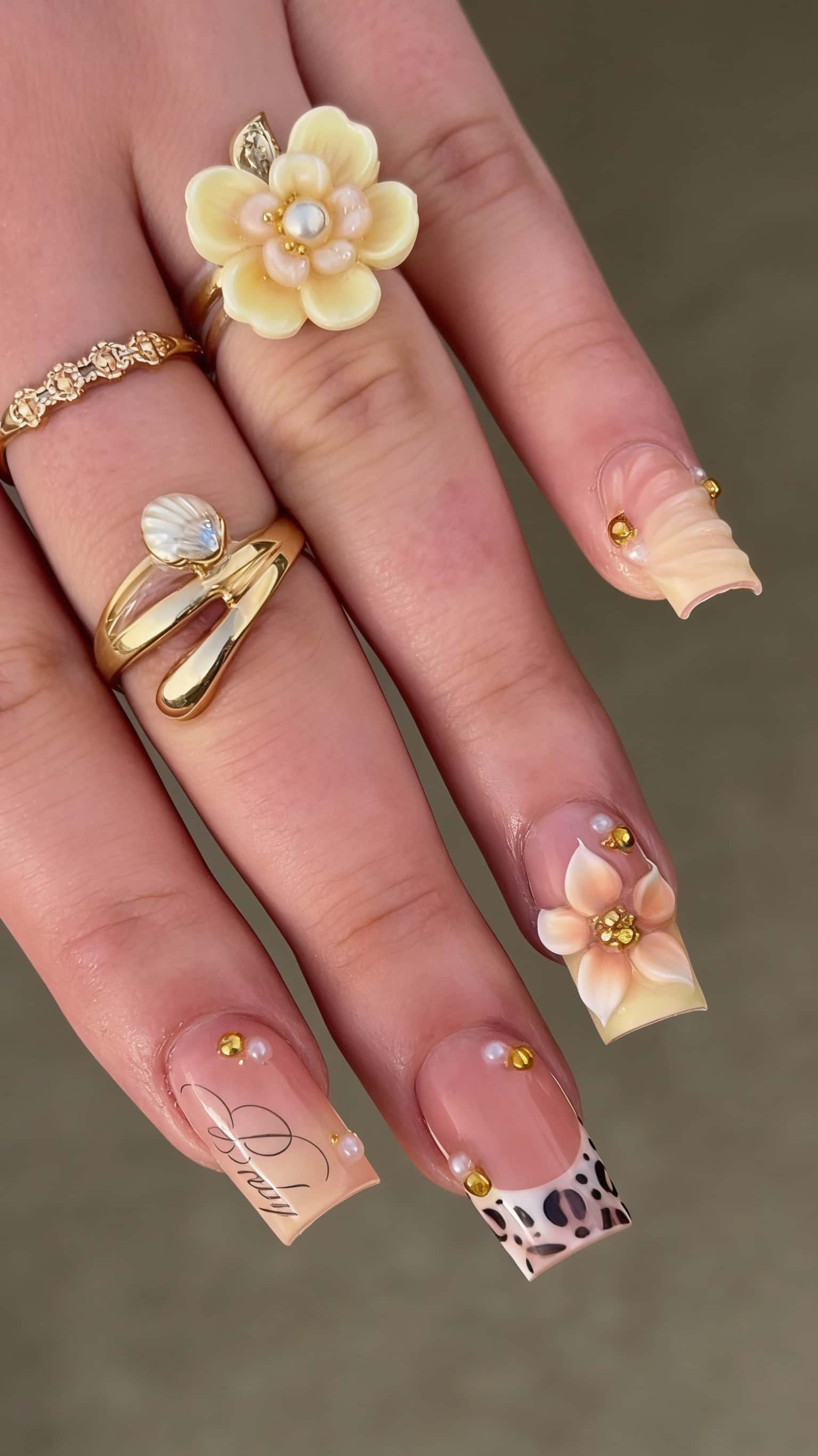 Long square nails with a glossy nude base.
