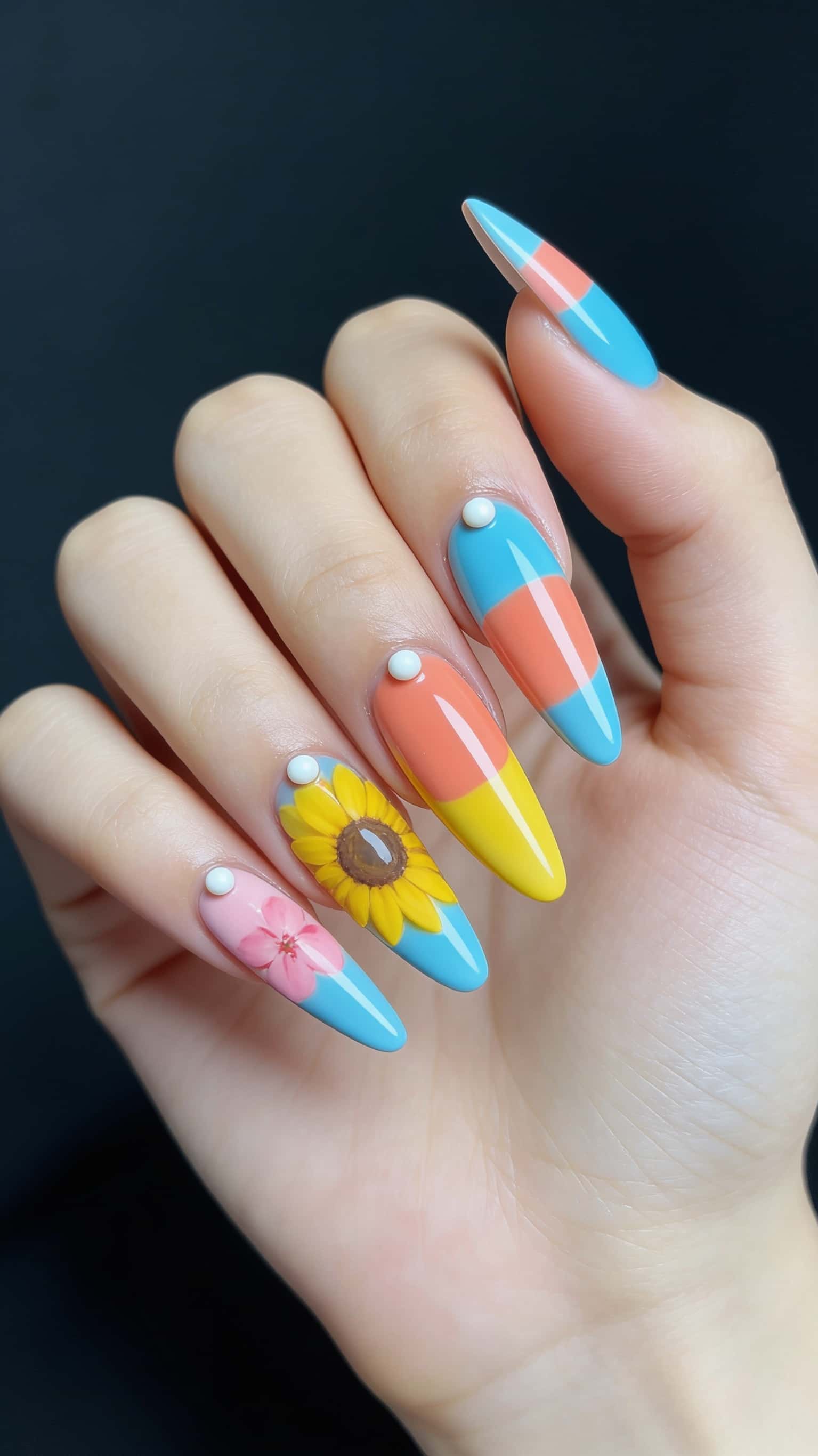 Long stiletto nails with a glossy finish.